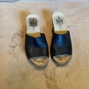 Tall black leather sandals